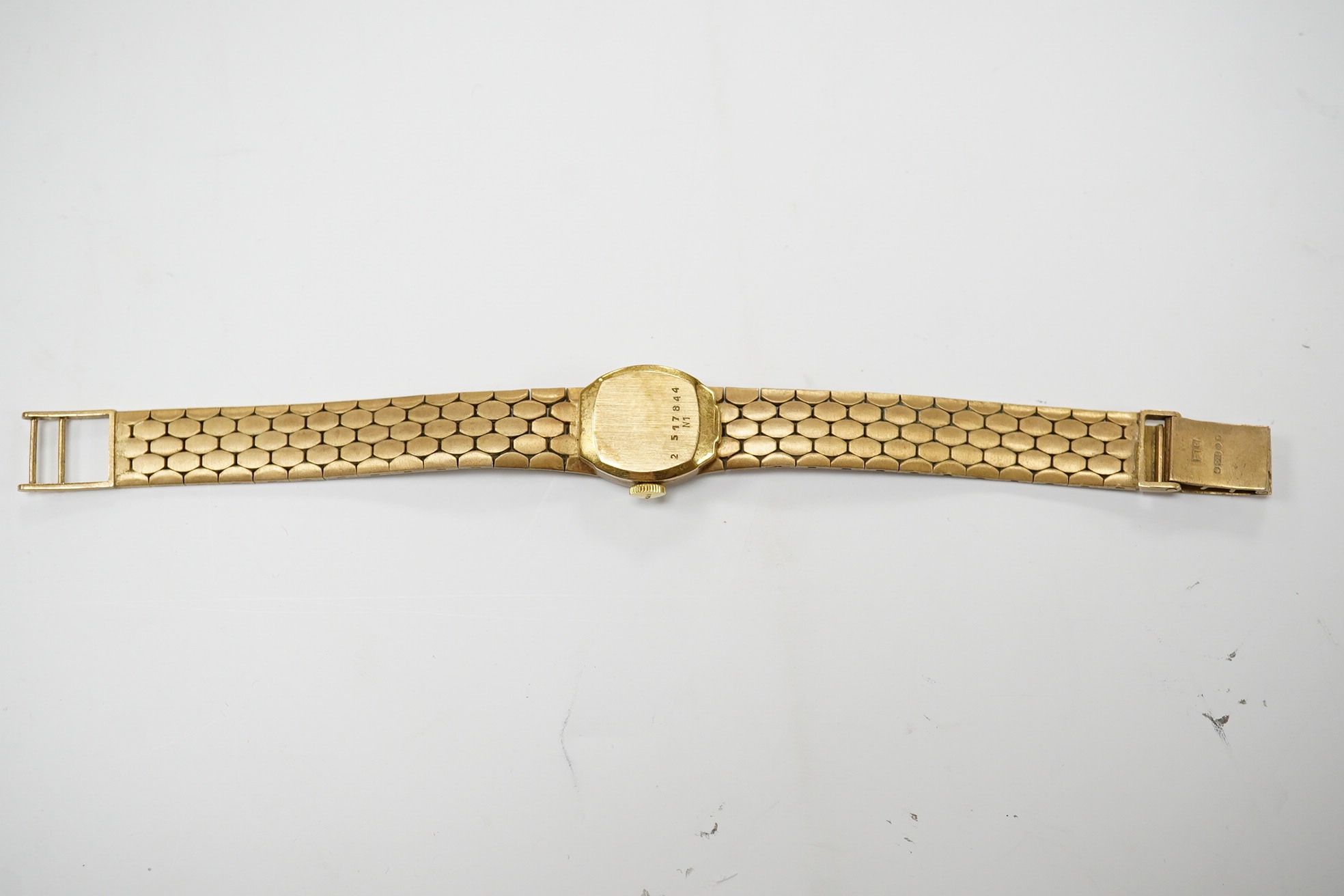 A lady's early 1970's 9ct Bulova manual wind bracelet wrist watch, overall length 15.6cm, gross weight 23 grams. Condition - fair